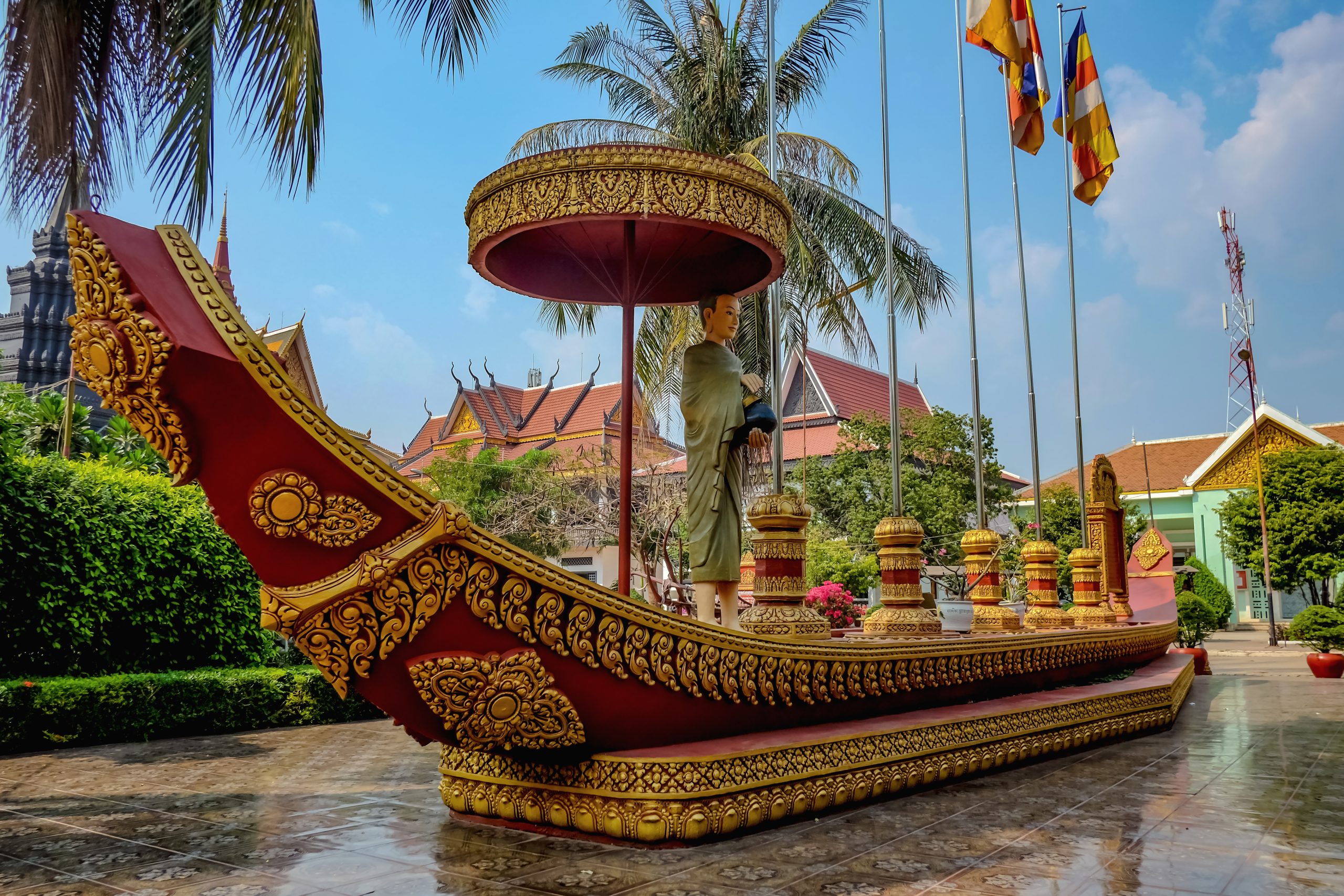 Beautiful boat with the monk statue on the boat in the temple,siem reap cambodia