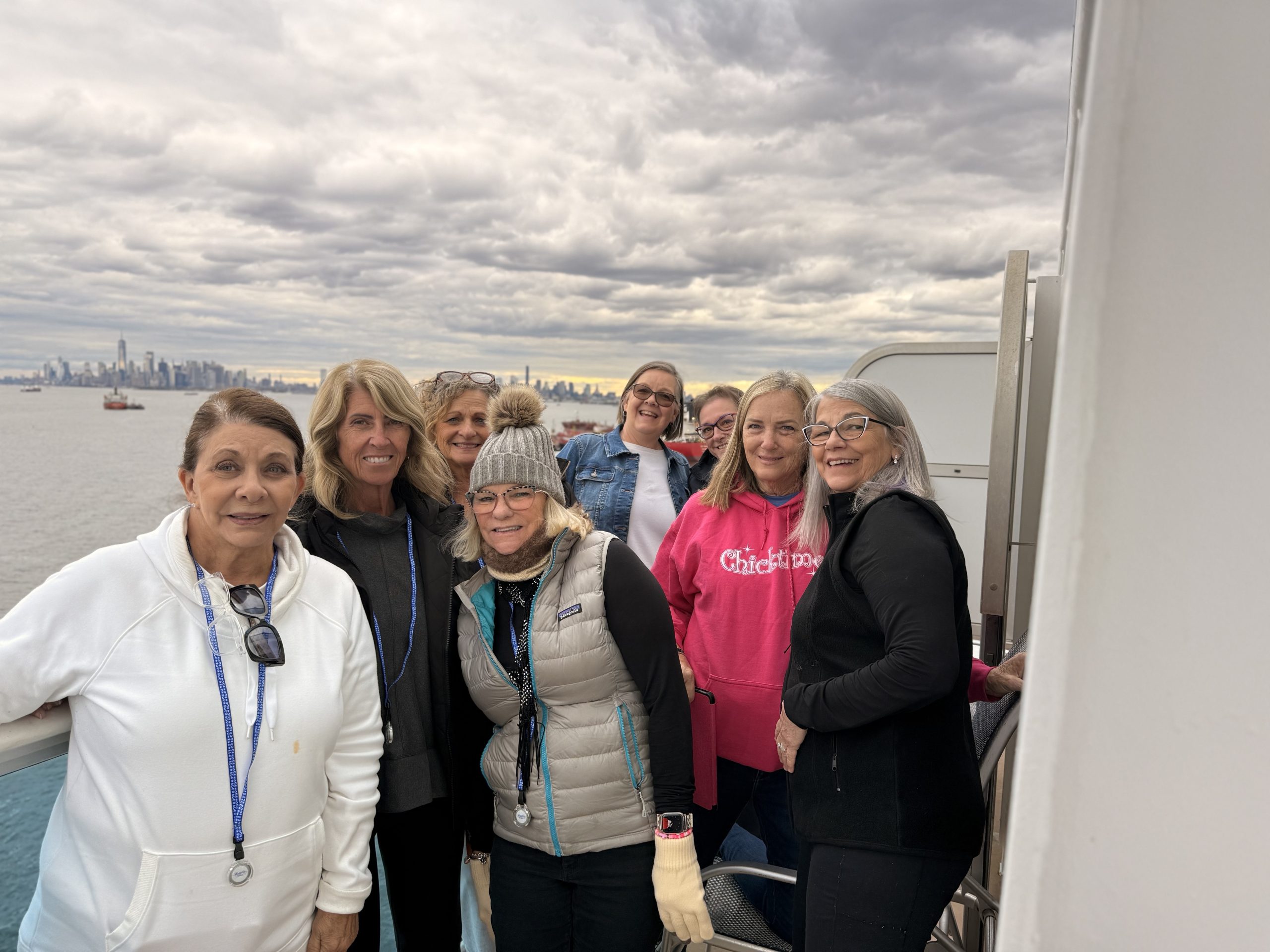 group of women on a ship balcony